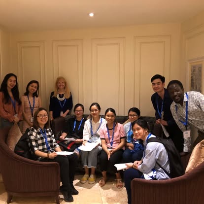 Kectil participants seated around a meeting table.