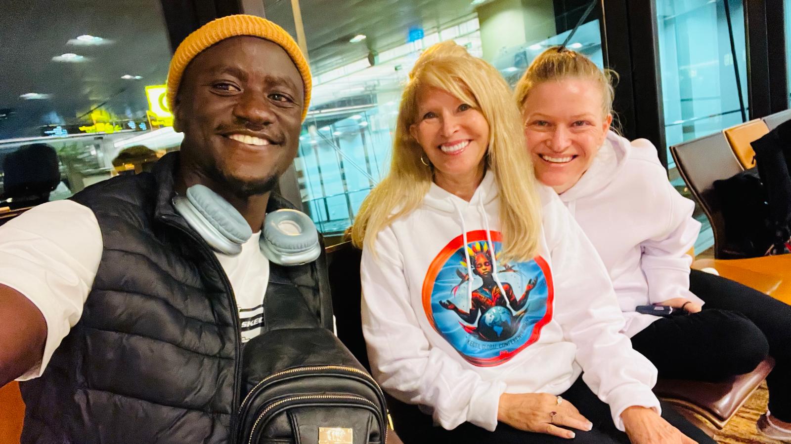 Three Kectil participants taking a selfie at an airport.